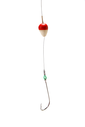 Fishing hook with bobber. White background