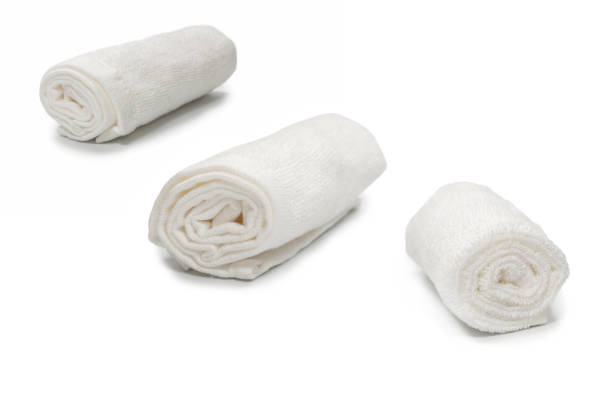 istock White fluffy cotton towel isolated on a white background. 1334291961
