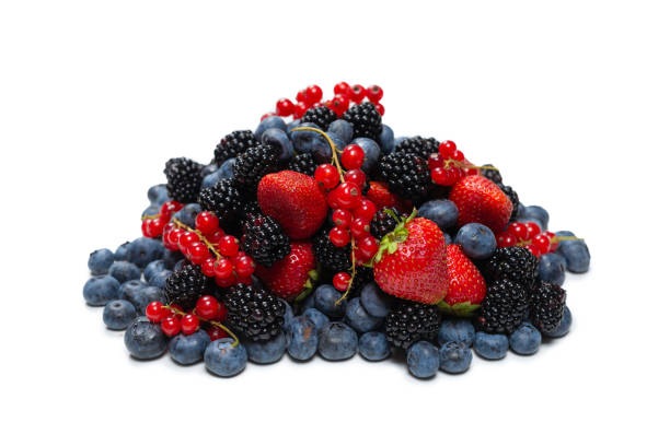 istock Blackberry, raspberry, blueberry,  red currant and mint background. 1334292044