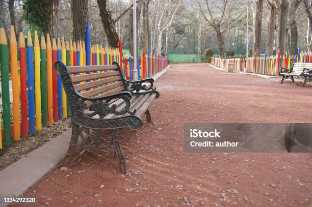 Fence In The Form Of Colored Pencils Bench In The Park Near The Fence In The Form Of Large Colored Pencils Vake Park In Tbilisi Stock Photo - Download Image Now