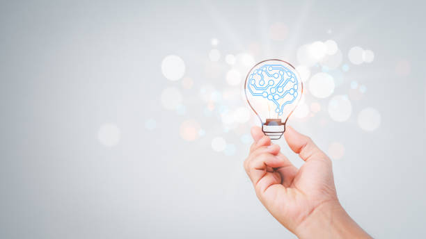 istock The man's Hands holding a light bulb for a new idea. The concept with innovation and inspiration, innovative technology in science and communication. 1334294558