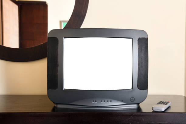 istock An old black TV with a white screen for adding images is on the bedside table in the apartment. Vintage TVs 1980s 1990s 2000s. 1334299488