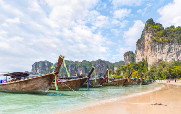 istock Long tail boats on Railay beach 1334304203