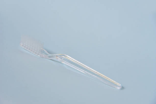 istock White toothbrush isolated on color background 1334305433
