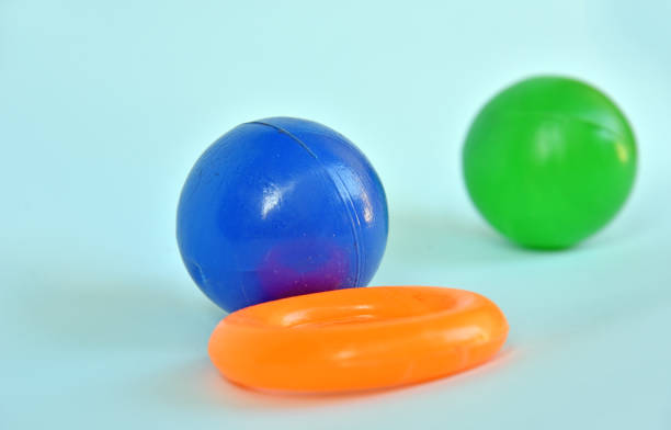 istock Kids toy,plastic ball and ring isolated on color background 1334311248