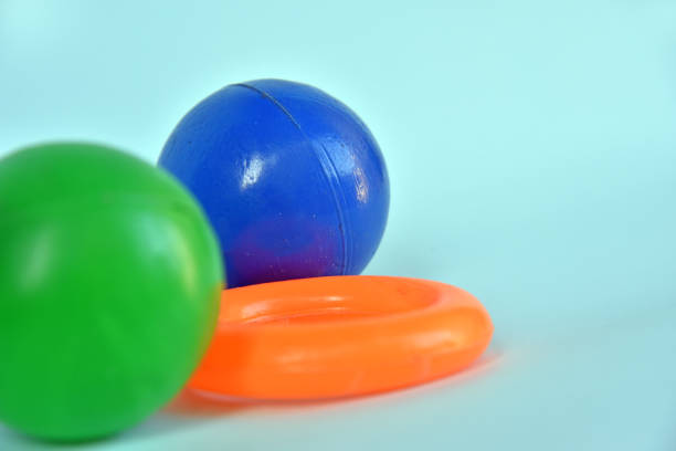 istock Kids toy,plastic ball and ring isolated on color background 1334311949