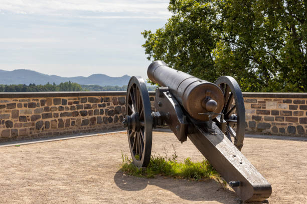 Bonn, Germany - Aug 15th 2021: Old cannon is left standing on city fortification in Bonn to remind of towns heritage.