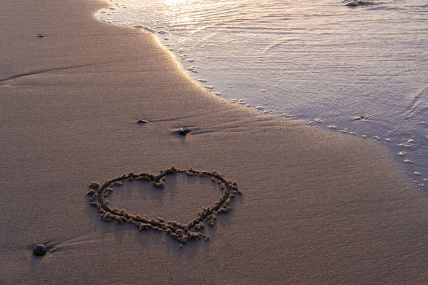 istock heart painted on the sand by the baltic sea 1334314101