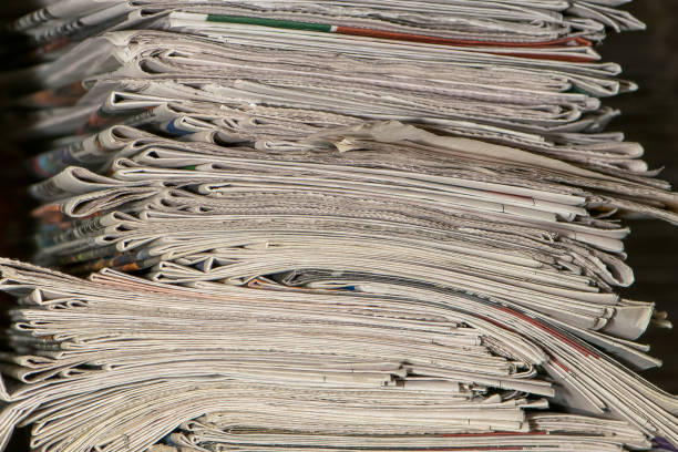 bunch of old newspapers, pile of paper, paper trash, waste paper stock photo