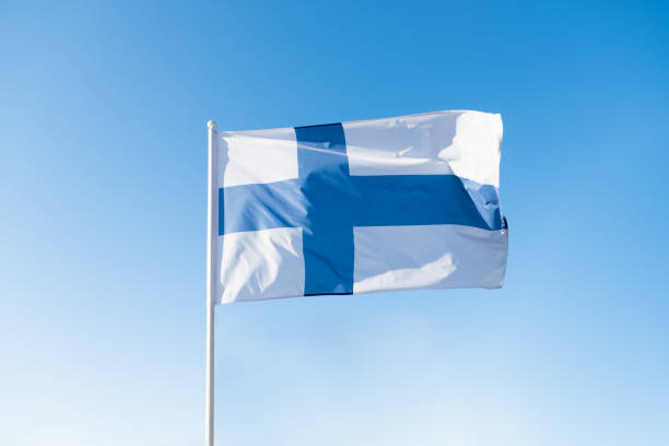 Flag of Finland on blue sky background.