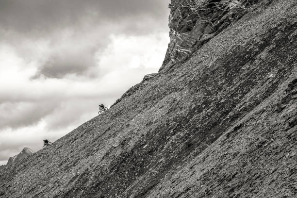 istock View of mountain bikers descending mountain ridge 1334320571