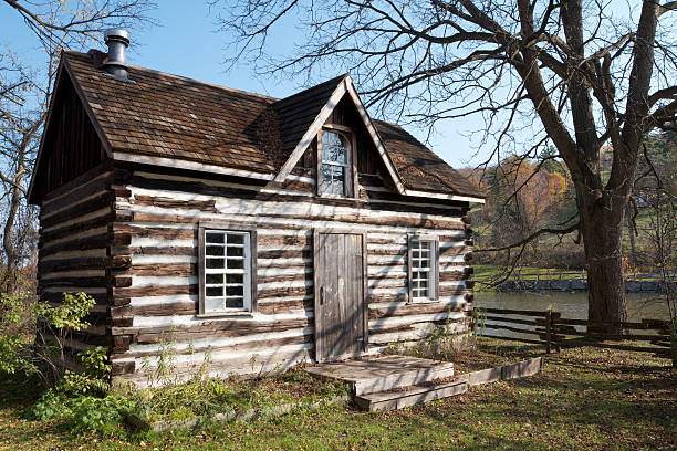 istock Old rural log cabin with view of river 133432145