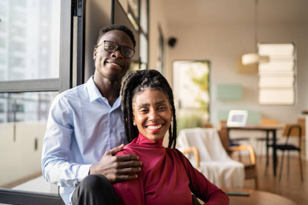 istock Portrait of a happy couple at home 1334325552