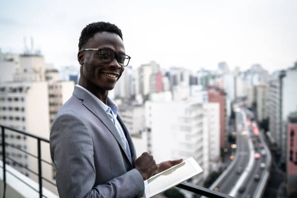 istock Portrait of a businessman using digital tablet in a rooftop 1334325595