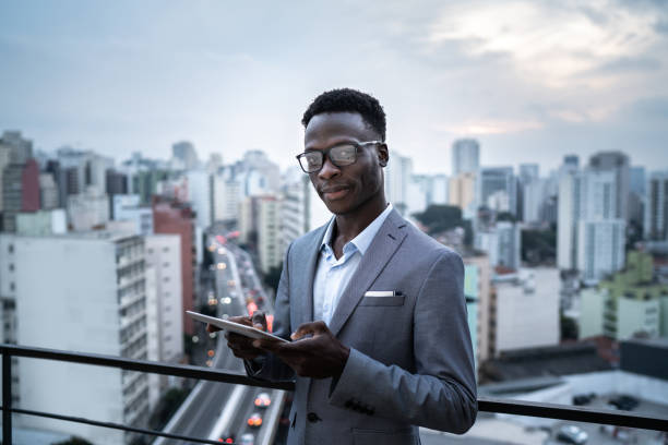 istock Portrait of a businessman using digital tablet in a rooftop 1334325632