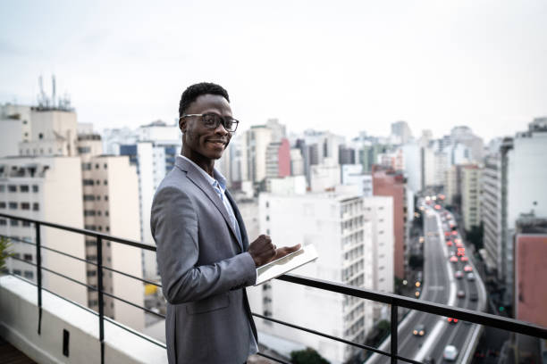 istock Portrait of a businessman using digital tablet in a rooftop 1334325692