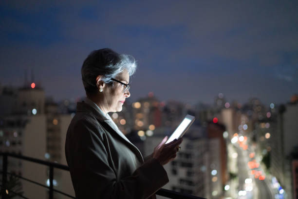 istock Senior businesswoman using digital tablet in a rooftop 1334326988