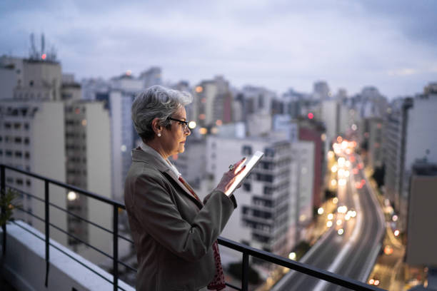 istock Senior businesswoman using digital tablet in a rooftop 1334327002