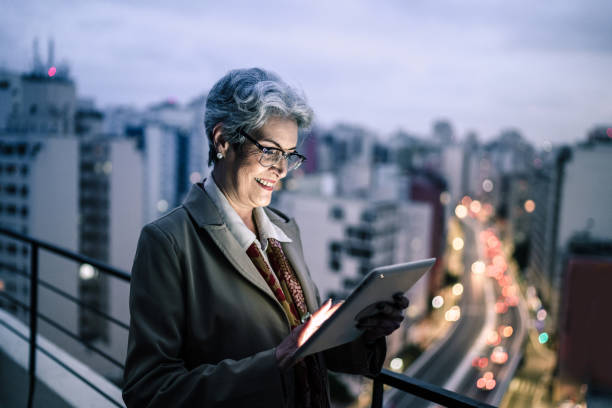 istock Senior businesswoman using digital tablet in a rooftop 1334327023