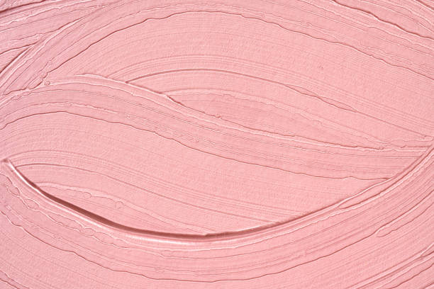 istock Aloe vera cosmetic gel spread over pastel pink background 1334331969