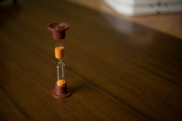 istock soft focus sand clocks vintage style decorative object on smooth wooden table perspective surface indoor photography concept with empty space for copy or your text here 1334333014