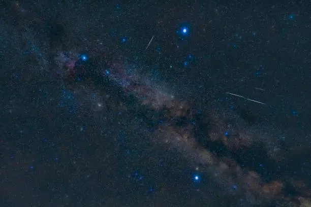 The Summer Triangle and meteors photographed on August 12, 2021, from Gruenstadt in Germany.