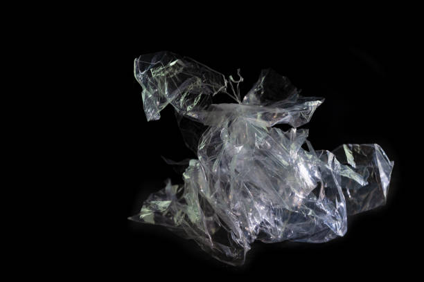 istock plastic foil from a disposable bag shown like a horse sculpture against a black background, packaging waste of abundance and throwaway society, consumes resources and energy, produces microplastic and harms environment and climate 1334337768