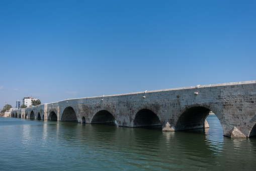 historical stone bridge in adana, seyhan river, taskopru,