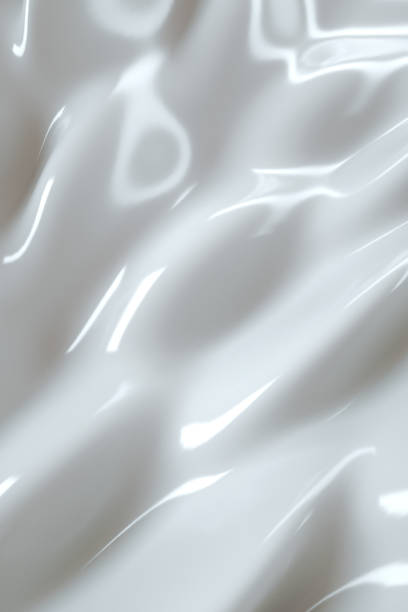 istock 3D white creamy background. Liquid texture. Make-up, beauty cosmetic minimal template with copy space 1334340367