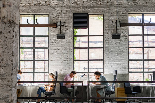 istock Stimulating Work Environment: Focused Businessmen Working at the Office 1334341129