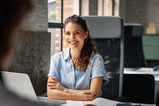 istock Beautiful Businesswoman Enjoying her Work 1334341236