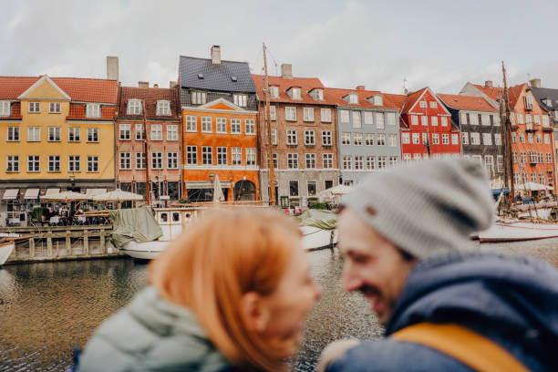 romantic couple enjoying the view - white denmark nordic countries winter imagens e fotografias de stock