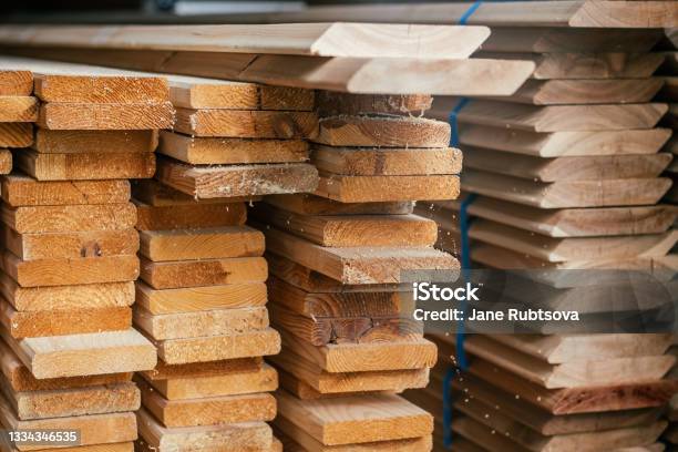 View Of Ends Of Stacked Edged Boards For Construction Of Fence Or Cladding House Timber Prepaired For Building Stock Photo - Download Image Now