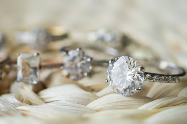 istock Jewelry diamond wedding rings close up 1334359375