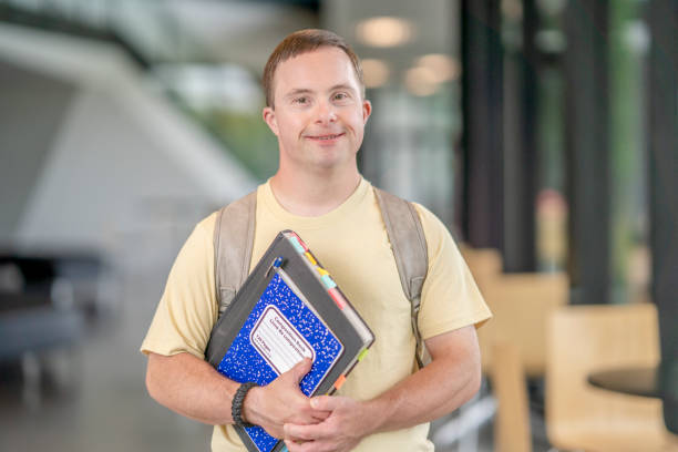 istock Portrait of a university student with Down syndrome 1334361177