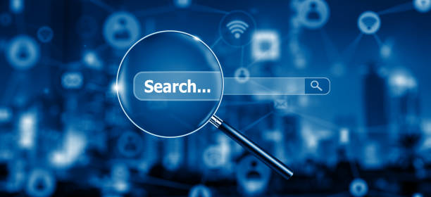 istock Search Engine Optimisation - SEO - with Magnifying glass on Network and Social Media. 1334365203