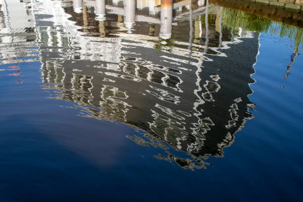 istock Beach houses reflection on the water 1334365251
