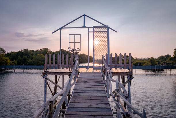 istock Wooden house frame over the sea 1334366272