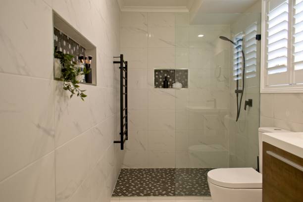 Ensuite bathroom - selective focus Luxury ensuite bathroom with plantation shutters niche photos stock pictures, royalty-free photos & images