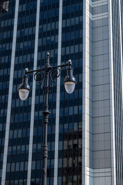 istock Street lamp and modern building 1334374844