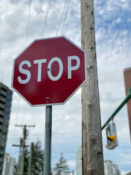 istock Stop sign town city warning lights 1334375749