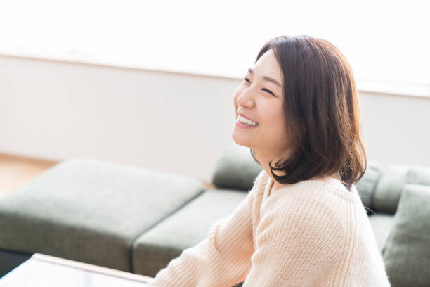 istock attractive asian woman relaxing 1334376668
