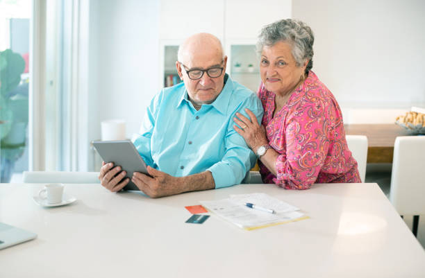 istock Tow seniors buying stuff online 1334379001