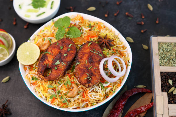 biryani peixe. picante e delicioso malabar biryani ou hydrabadi biryani, dum biriyani - fish spice - fotografias e filmes do acervo