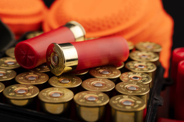 Shotgun shell bullets and clay shooting target , Can be used as a background