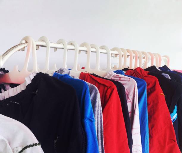 istock Clothes hanging on hangers. 1334385847