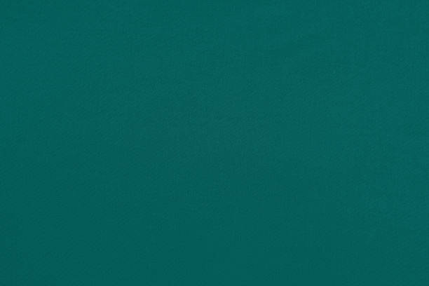 istock Green homogeneous background with a textured surface 1334387320