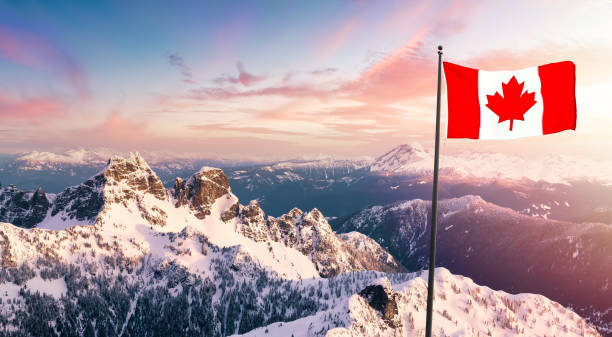 istock Canadian Flag Composite over Rocky Mountains Landscape 1334390753
