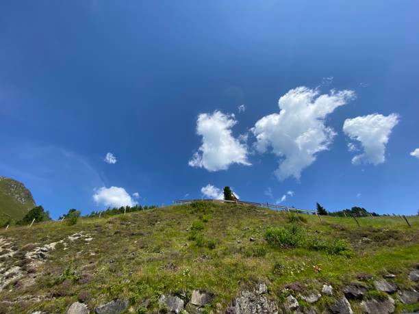 Zillertaler Höhenstrasse between Ried Hochzillertal and Hippach Tirol in summer in the Zillertal chapel of the Zellberg Buam Summer in Europe zillertaler alps stock pictures, royalty-free photos & images