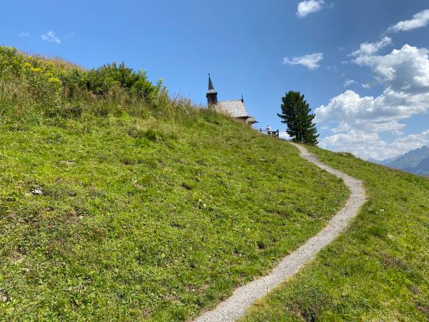 Zillertaler Höhenstrasse between Ried Hochzillertal and Hippach Tirol in summer in the Zillertal chapel of the Zellberg Buam Summer in Europe zillertaler alps stock pictures, royalty-free photos & images